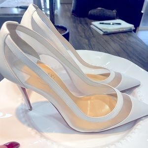 Never worn. Christian Louboutin stiletto heels in white